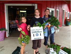 Buying local can be fun-image of happy shoppers.