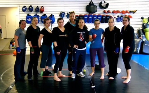 “The Dungeon Ladies” with 2012 Olympic hopeful Alex Love  (center, front) and instructor Deanne Tolley (center, rear) 