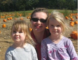 Apple picking with her daughters 