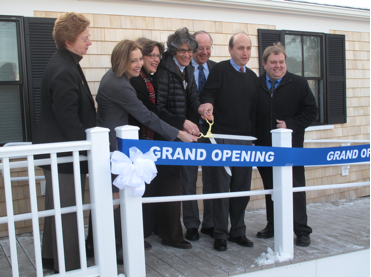 WeCan breaks ribbon at ceremony for new offices.