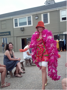 Cape Harmony member struts her stuff at the SHIFT Boutique Fashion Show to benefit the Cape Cod Maritime Museum in July 2013 